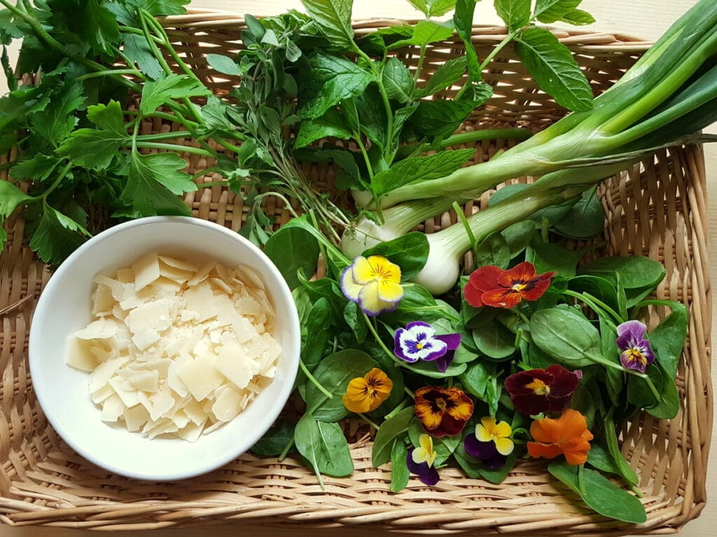 ingredients for green pasta salad in woven basket