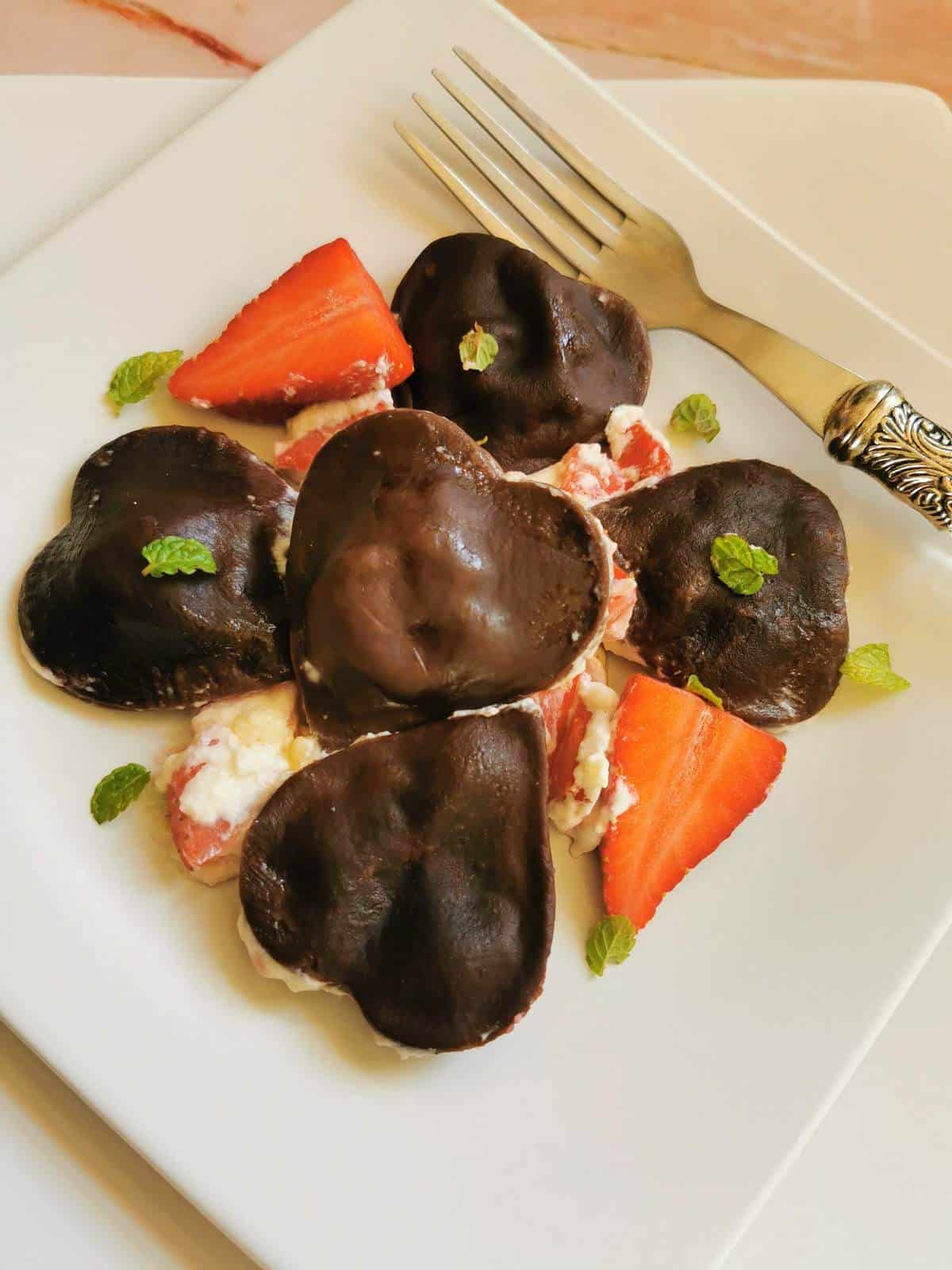 Homemade heart-shaped chocolate ravioli.