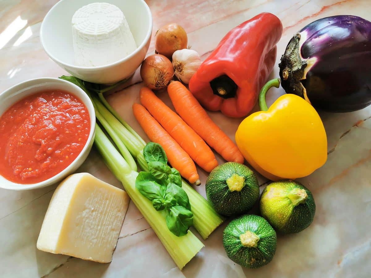 ingredients for alla pecorara sauce on marble worktop