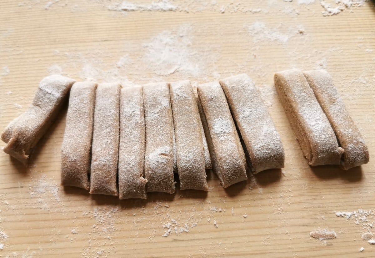homemade chestnut pasta dough cut into strips