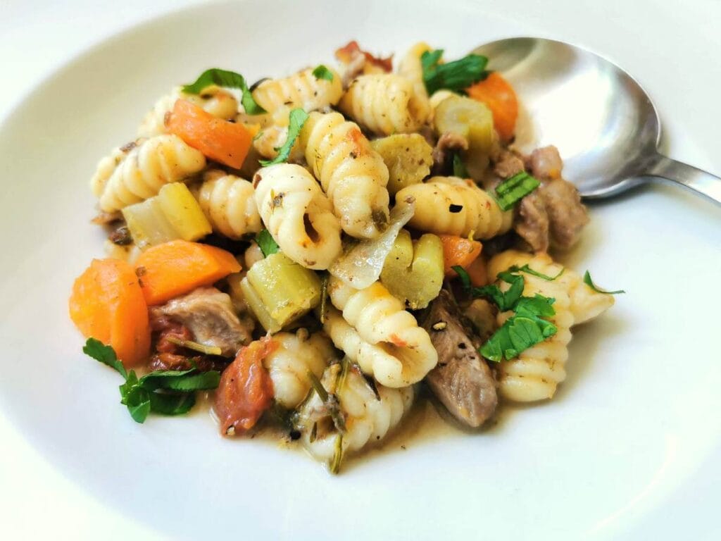 Sardinian pasta recipes - homemade malloreddus with lamb broth