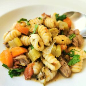 Homemade Sardinian gnocchi (malloreddus) cooked in lamb broth.