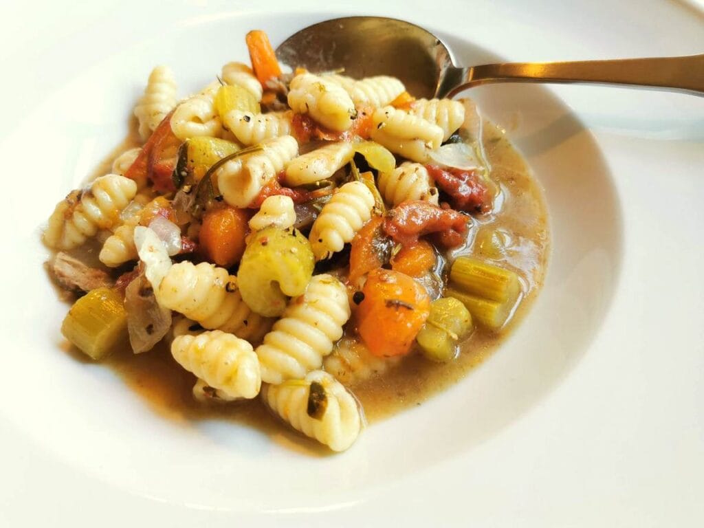 Homemade Sardinian gnocchi (malloreddus) cooked in lamb broth.