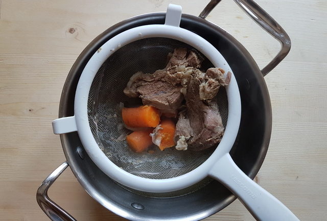 Homemade beef broth with whole-wheat grattoni pasta.