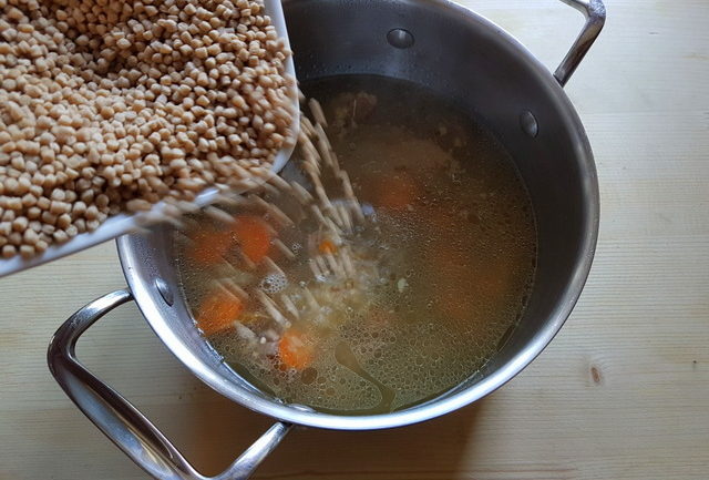 Homemade beef broth with whole-wheat grattoni pasta.