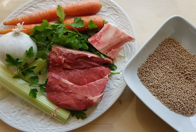 Homemade beef broth with whole-wheat grattoni pasta ingredients.