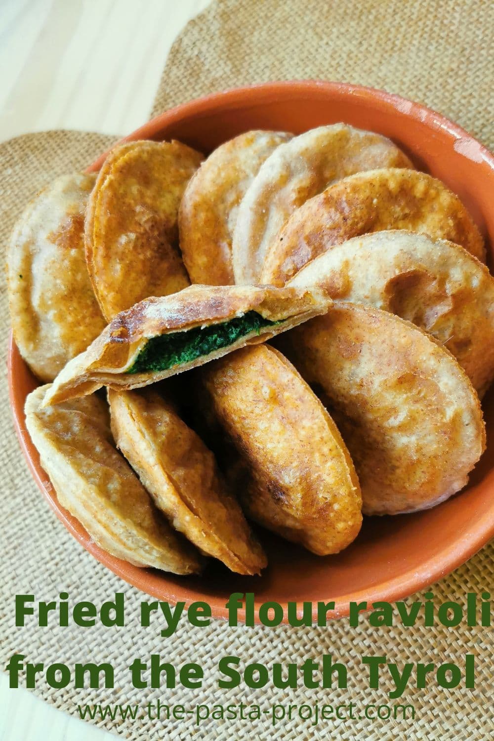 Homemade rye flour ravioli filled with spinach and ricotta.