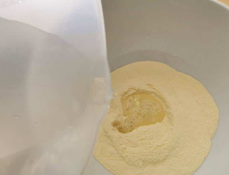 add tepid water to the semolina flour