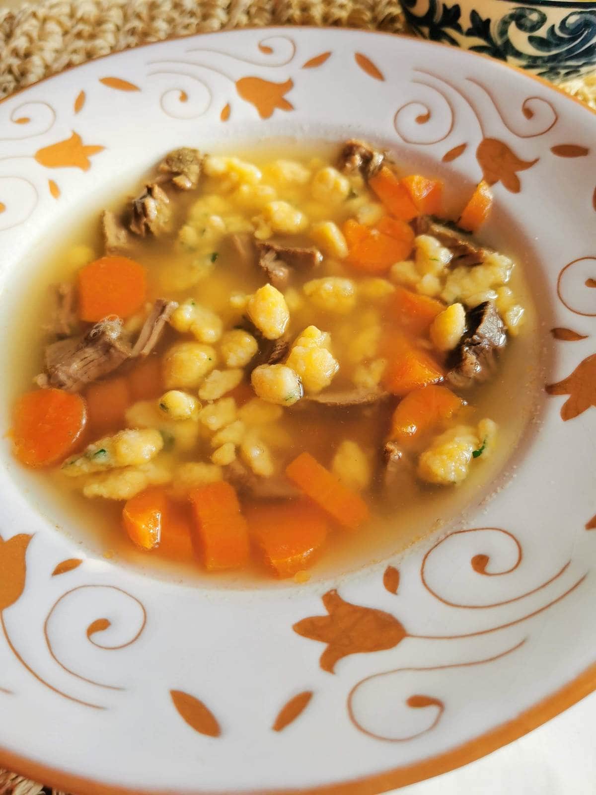 Homemade pastina in broth.