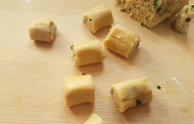 stuffed mezze maniche on wooden board