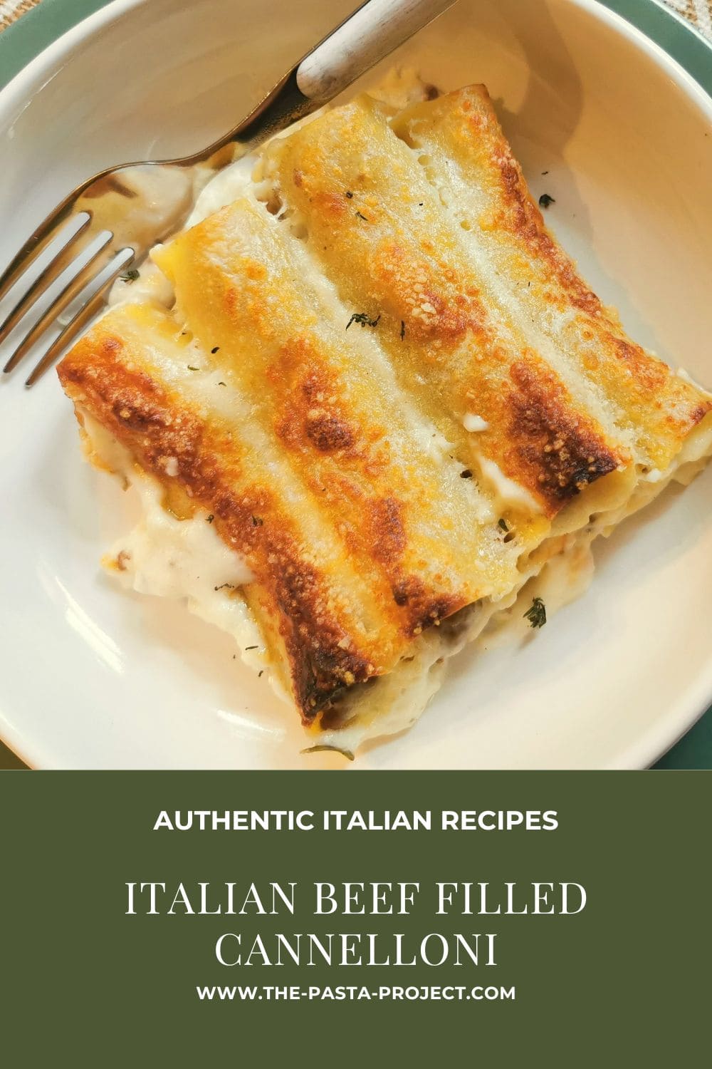 Verticle Pinterest image of Italian beef filled cannelloni.