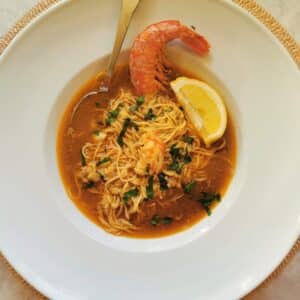 Italian fish soup with angel hair pasta.