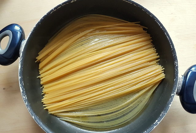 spaghetti cooking in lemon infused water for lemon water spaghetti recipe