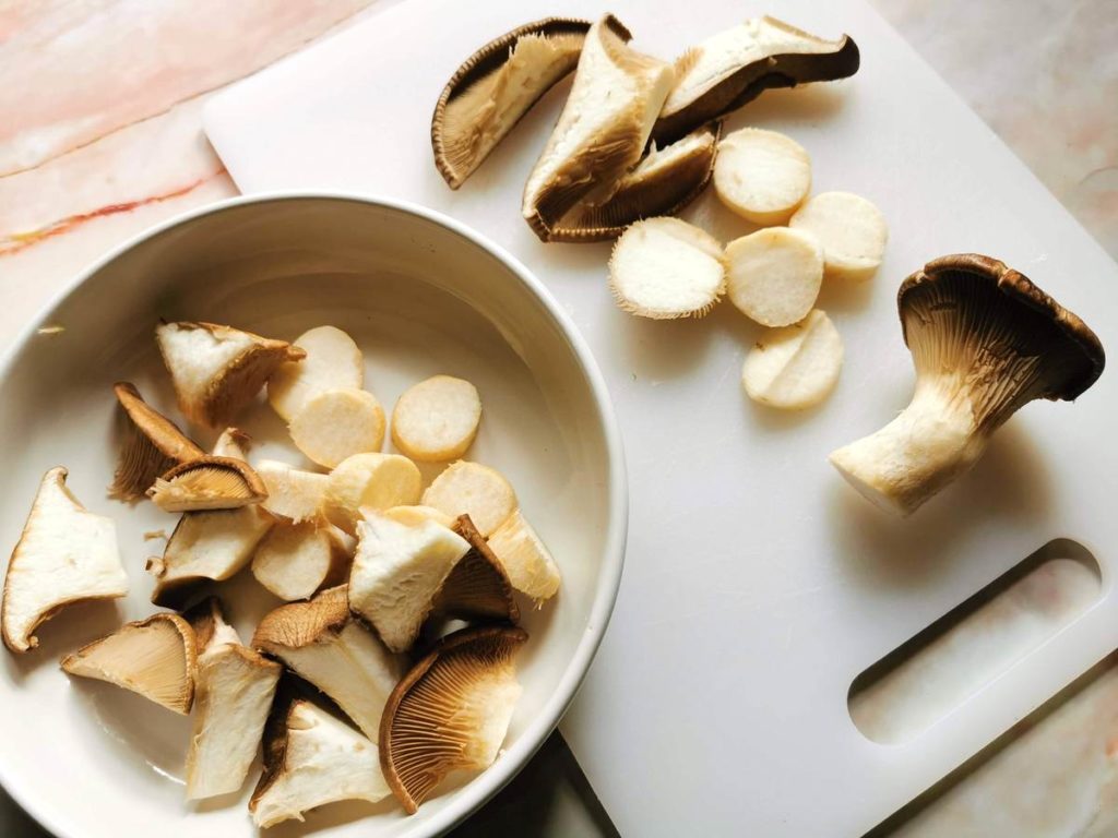 Oyster mushrooms cut into different shapes.