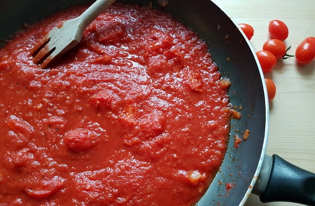 tomato and nduja sauce cooking in frying pan