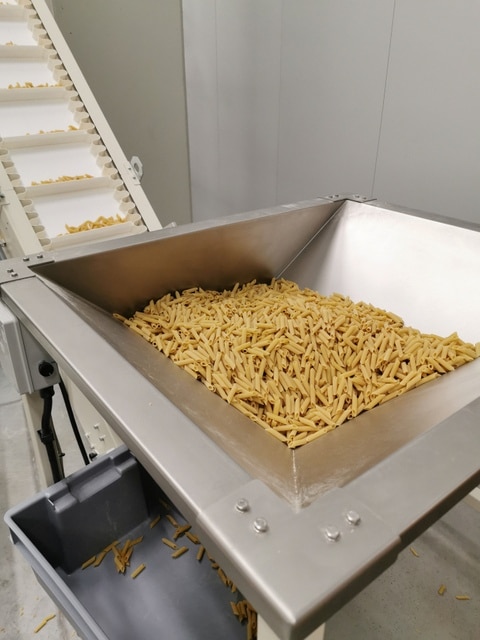 short pasta tubes on production line