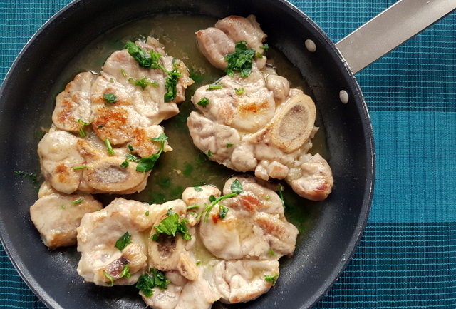 Pasta Ossobuco veal cuts cooking in frying pan