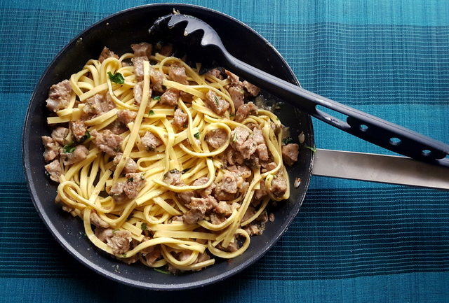 Fettuccine Pasta Ossobuco veal and pasta in frying pan 