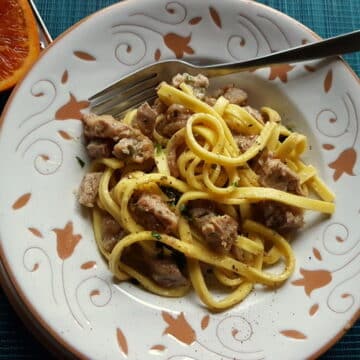 Fettucine Pasta Ossobuco in white terracotta bowl