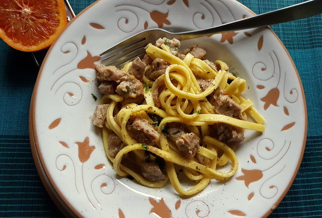 Fettuccine Pasta Ossobuco in white terracotta bowl 