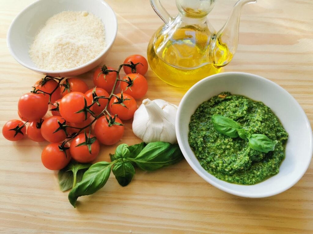ingredients for pasta portofino sauce on wooden board
