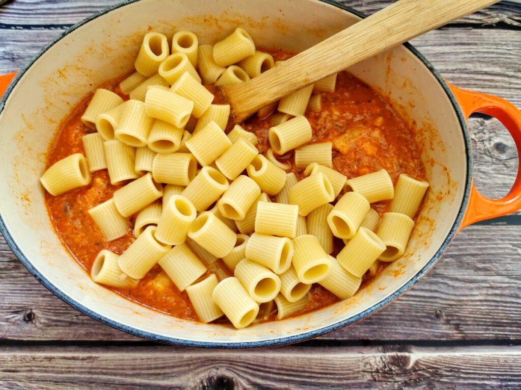 cooked pasta in Dutch oven with the soup.