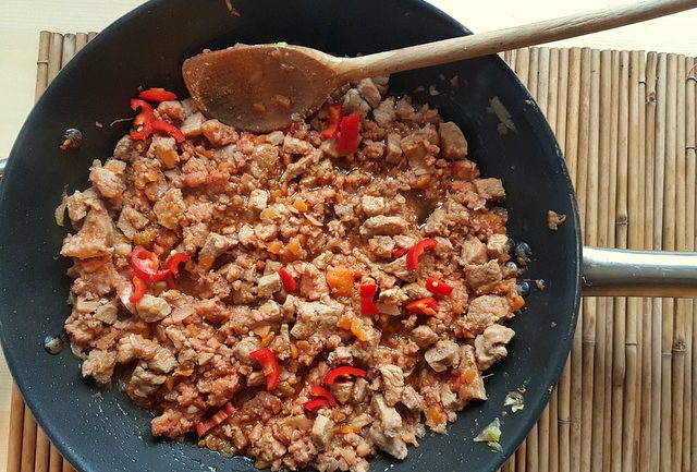 Pasta with Lamb ragu Molisano meat cooking in frying pan