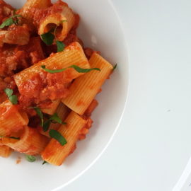 Pasta with Lamb ragu Molisano close up in white bowl