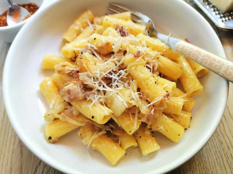 elicoidali pasta with Tropea onions and lardo