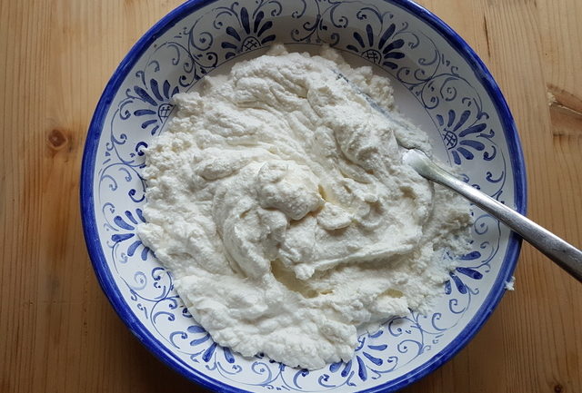creamed fresh ricotta in blue and white bowl