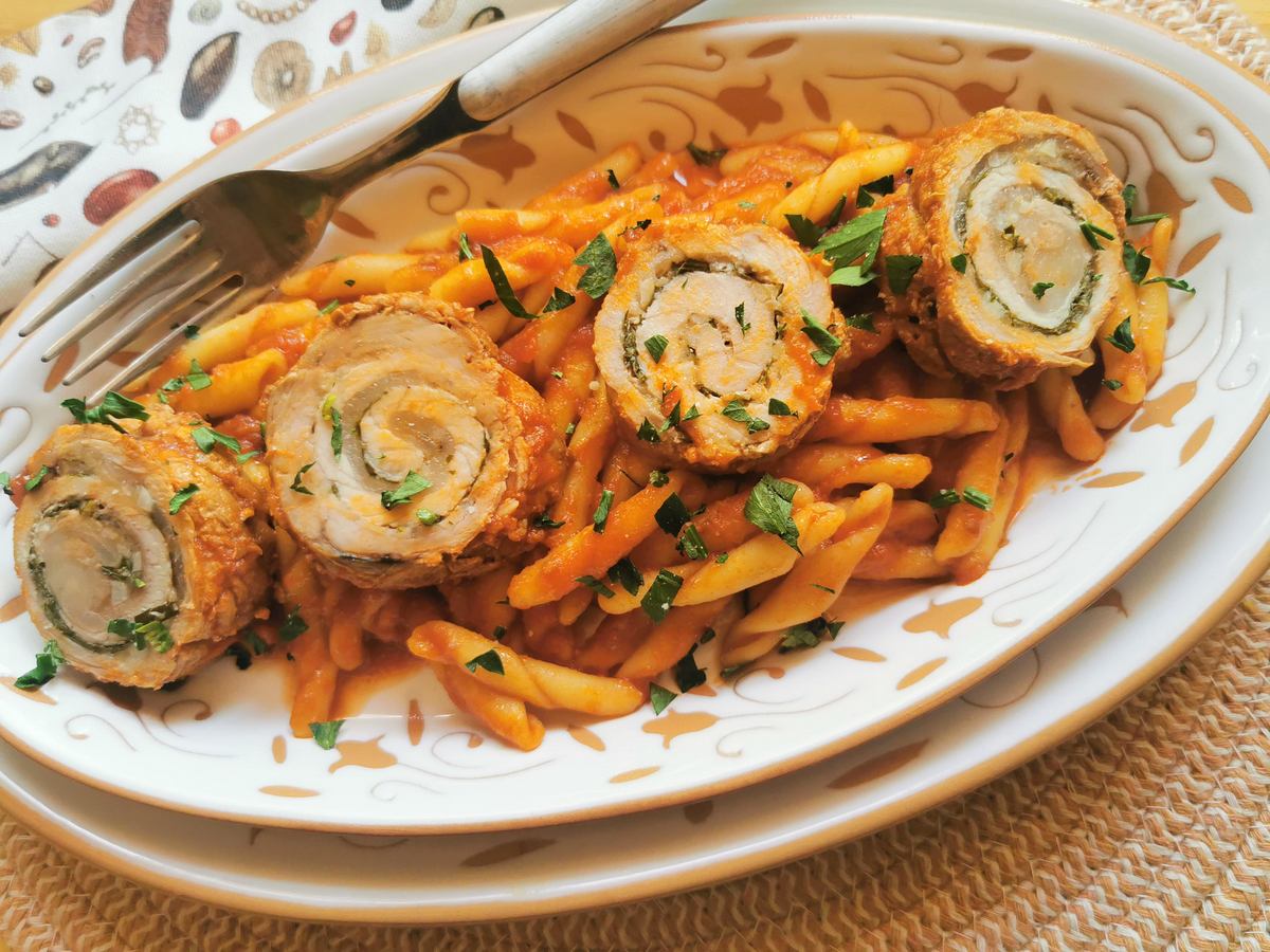 Pasta with pork involtini in tomato sauce alla Lucana. 