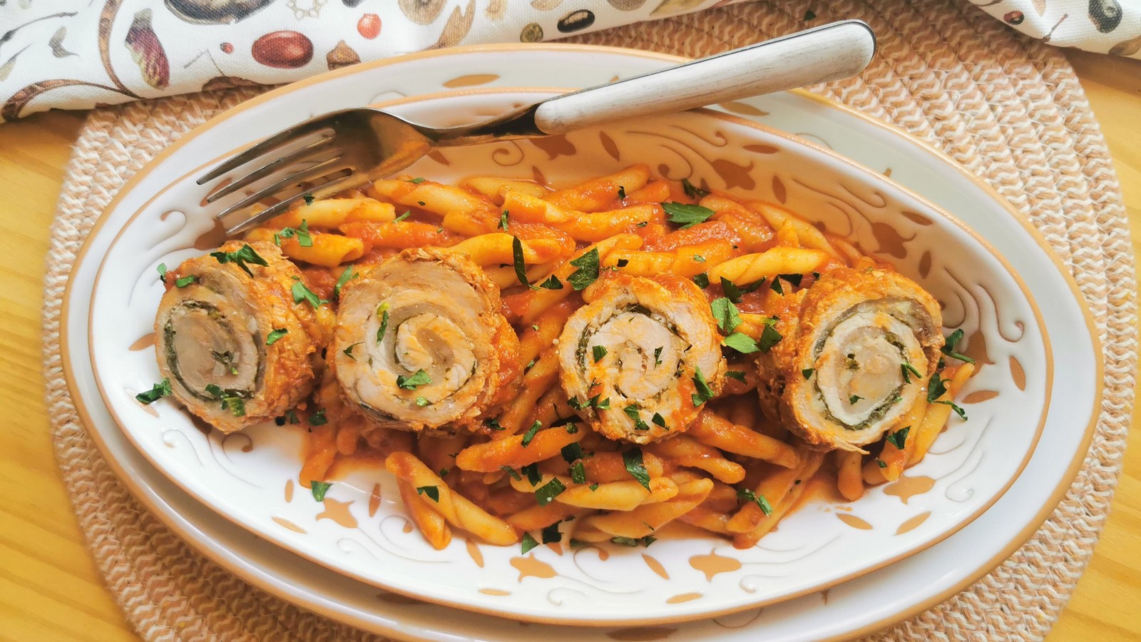 Pasta with pork involtini in tomato sauce alla Lucana..