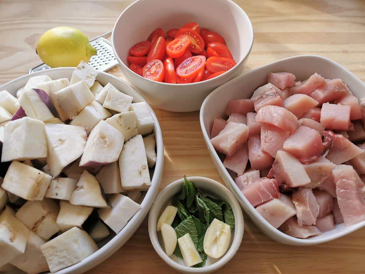 Ingredients for the swordfish pasta prepared and in bowls.