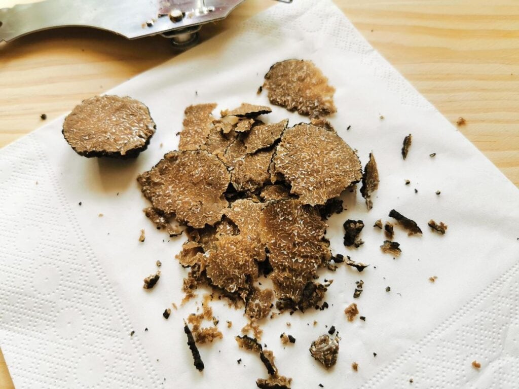 truffle shavings on white napkin