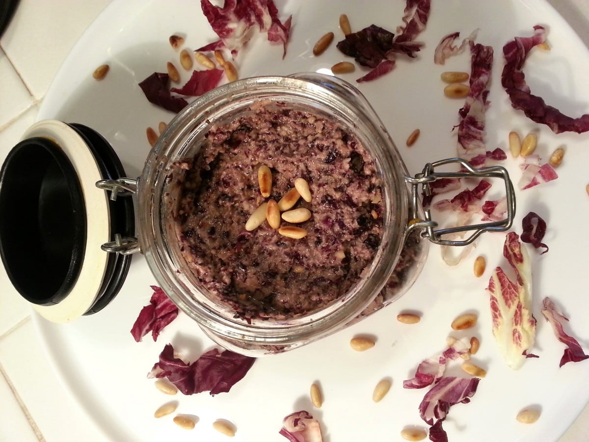 Busiate with radicchio pesto in a mason jar.