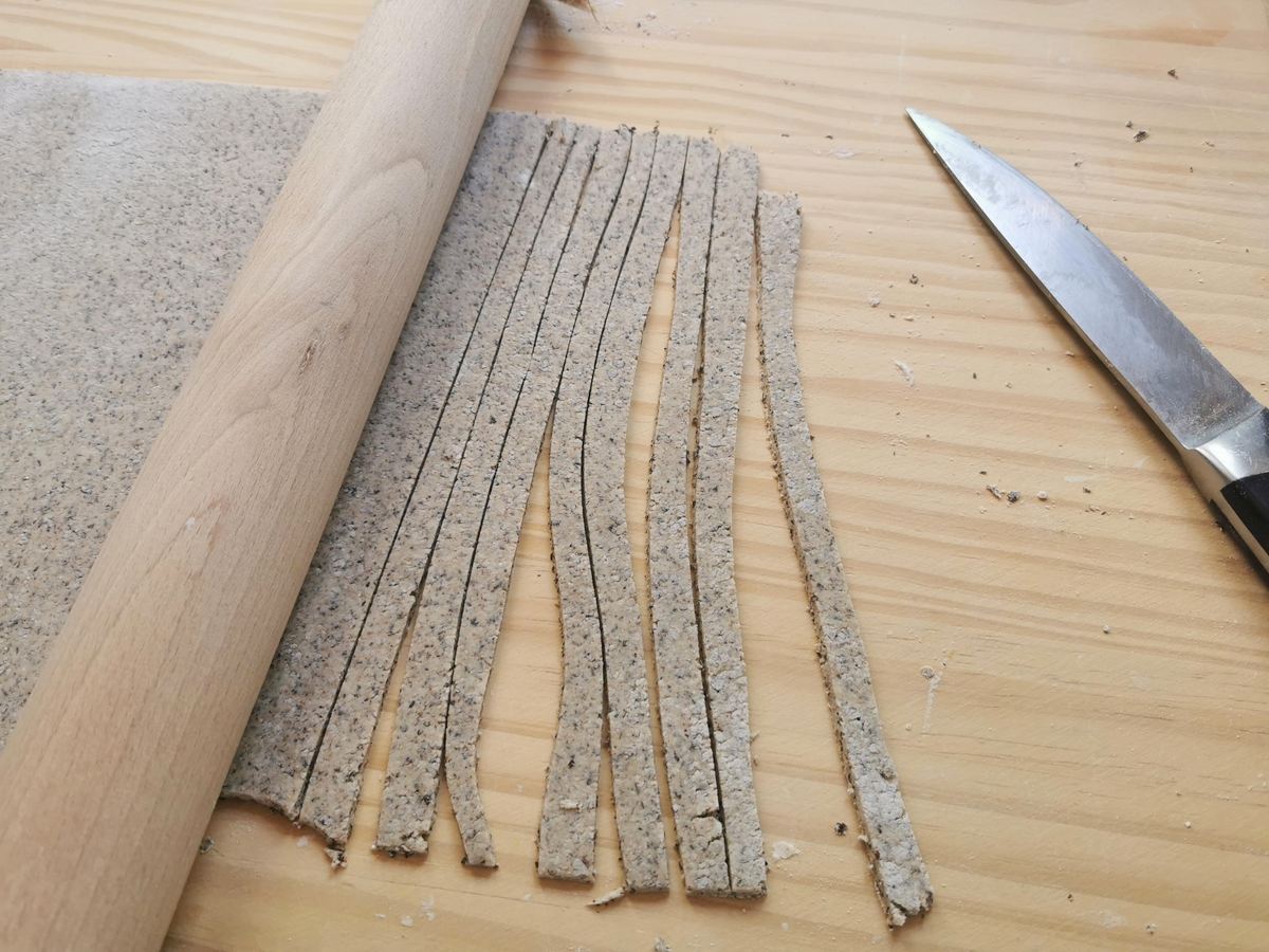 Pizzoccheri dough sheet cut into strips (strands).