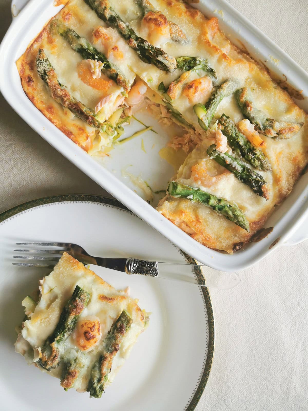 Poached salmon and asparagus lasagne al forno (lasagna).