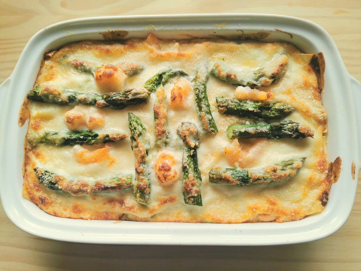 Poached salmon and asparagus lasagne al forno (lasagna).