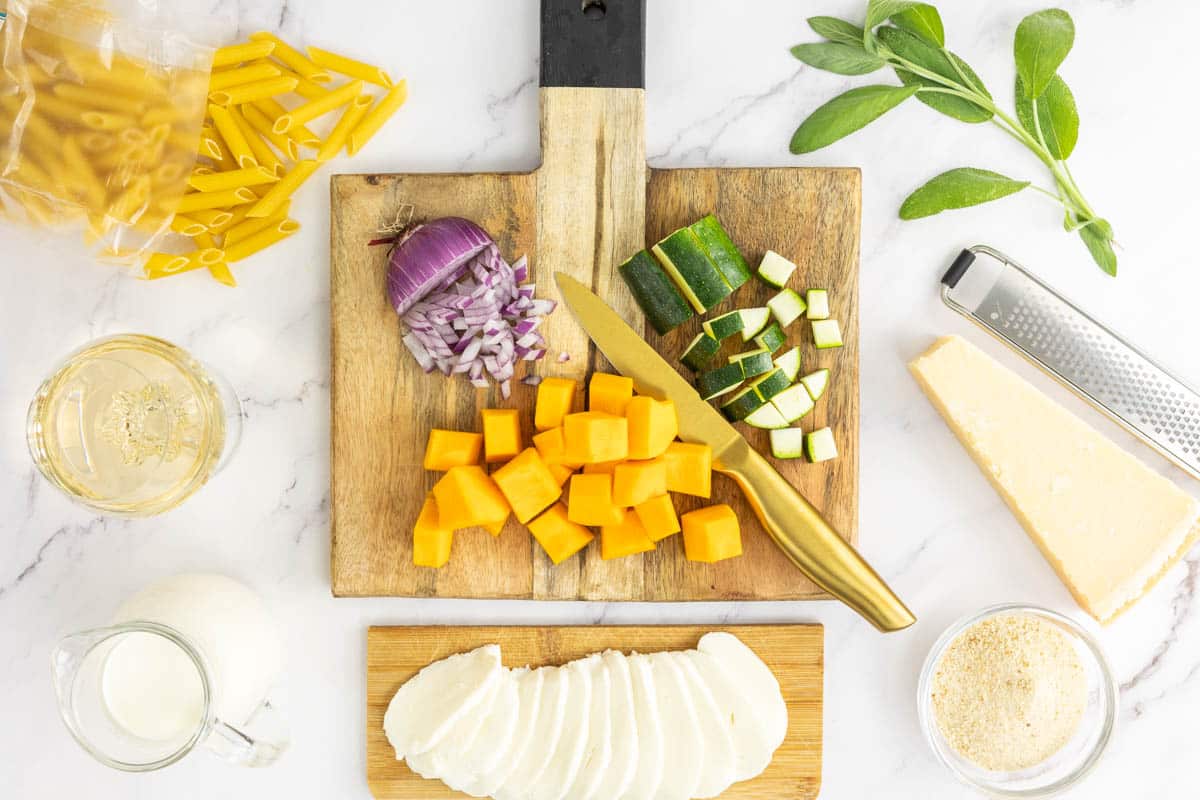 Ingredients for baked pumpkin pasta prepped and portioned