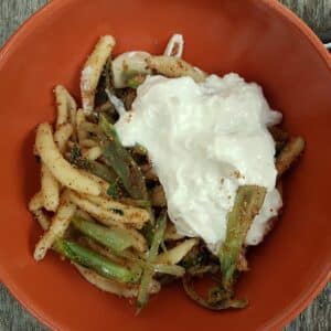 Cavatelli pasta with puntarelle and burrata.