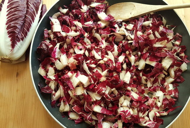 chopped radicchio cooking in frying pan