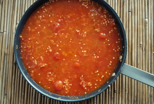 sauce cooking for Red lentil ragu with whole-wheat pasta 