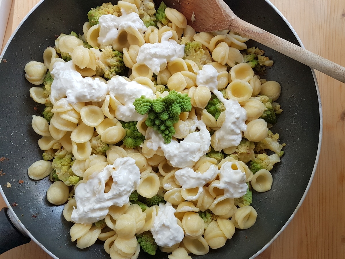 Burrata added to the pasta and Romanesco broccoli.