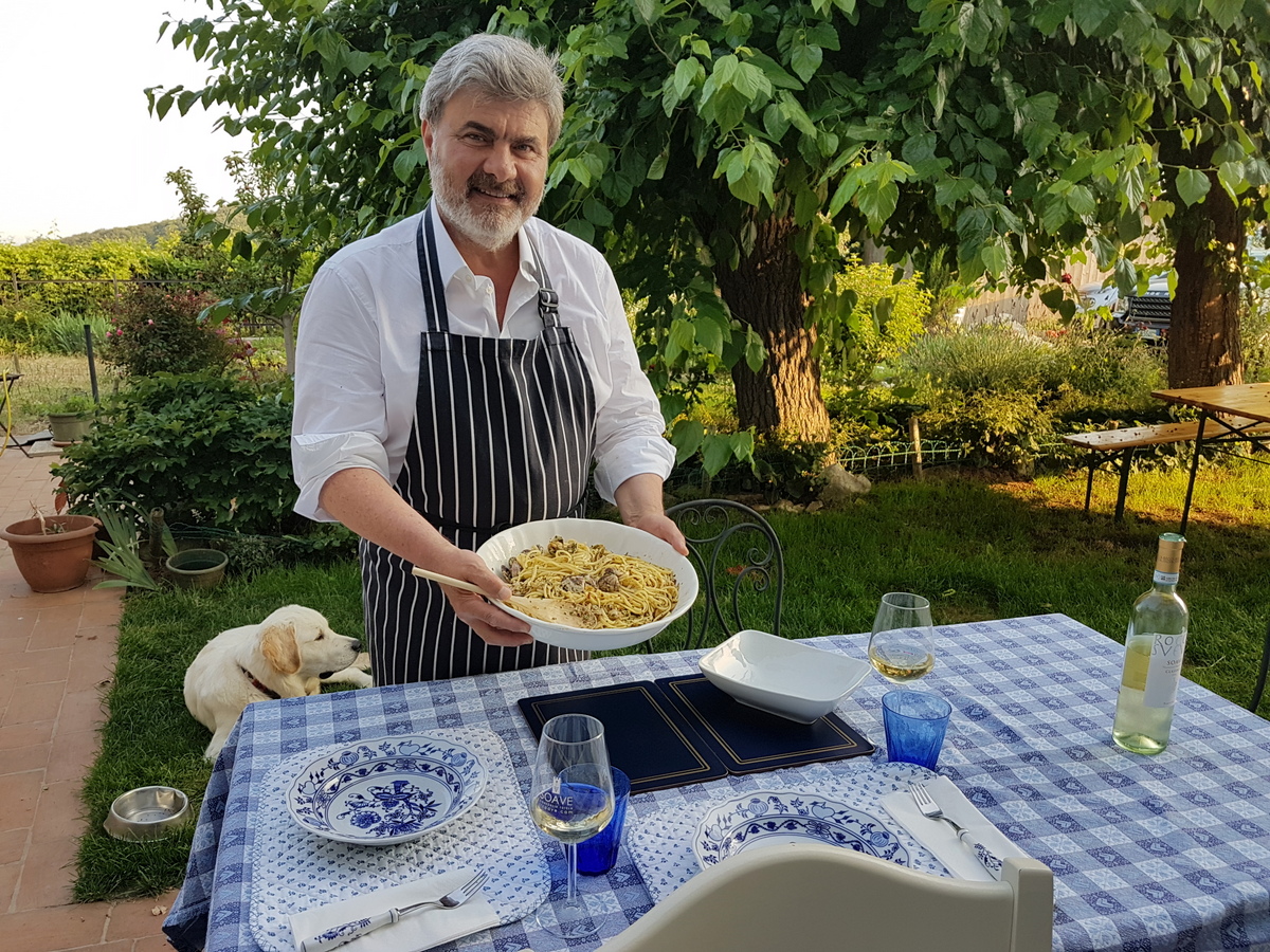 The author's husband Salvatore serving his linguine alle vongole.