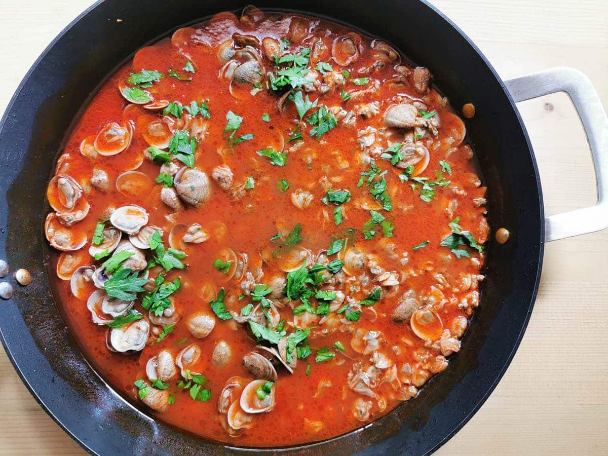 Clams and parsley in a tomato sauce