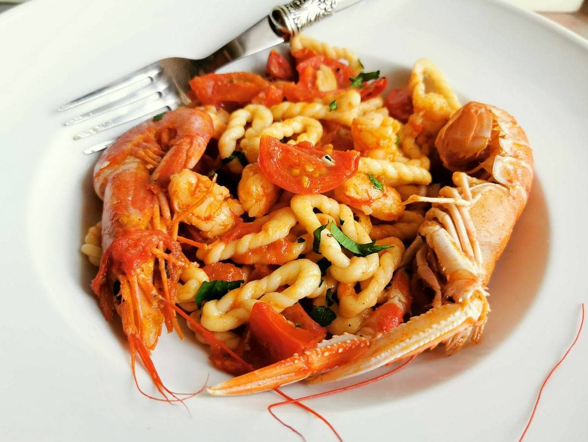 Sardinian lorighittas pasta with prawns and scampi.