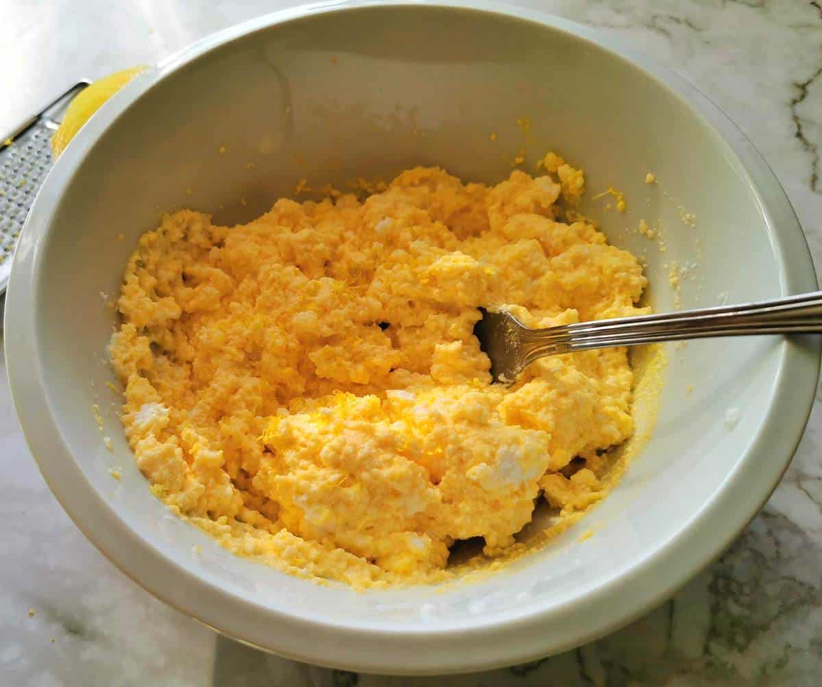 ricotta, saffron and lemon filling in white bowl