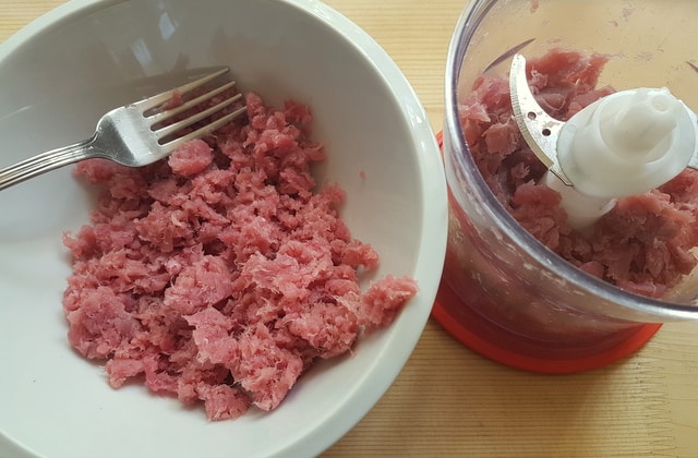 ground fresh tuna in food processor and in white bowl