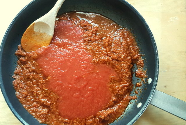 hyblaean pesto with cherry tomato sauce in frying pan