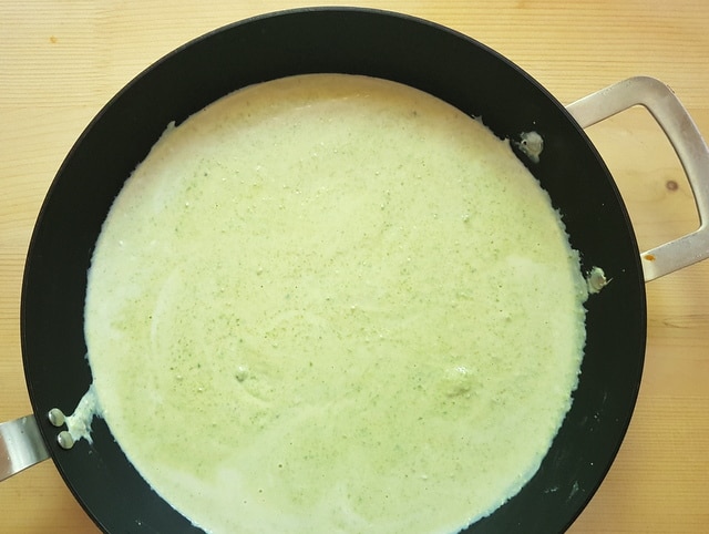 ricotta and pistachio sauce in deep frying pan